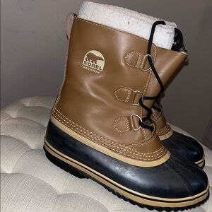 Sorel Tan and Black Winter Boots